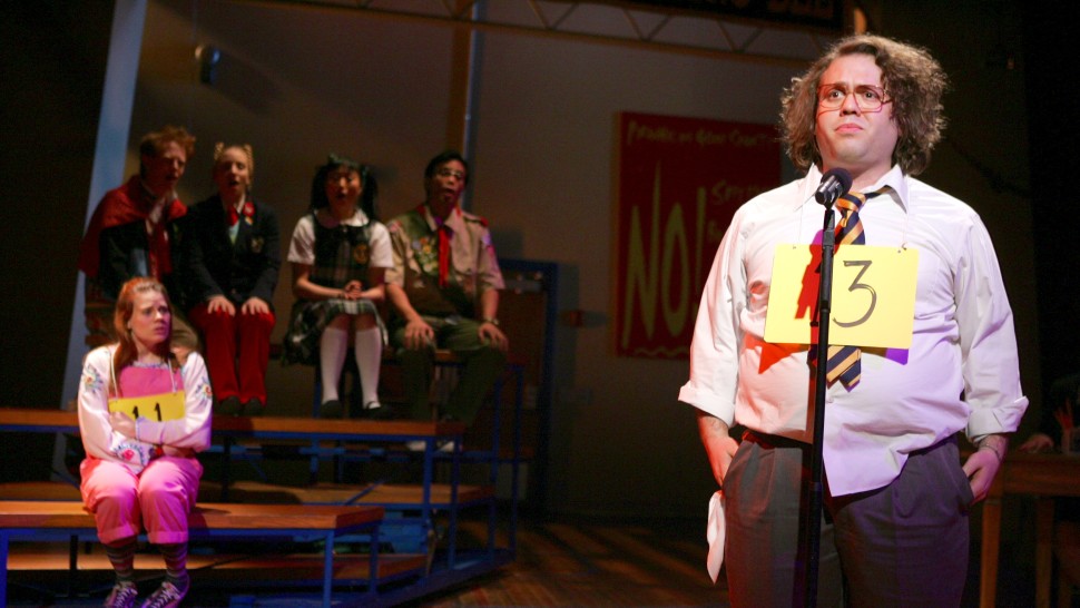 Dan Fogler (right) leads the company in a scene from <i>The 25th Annual Putnam County Spelling Bee</i>